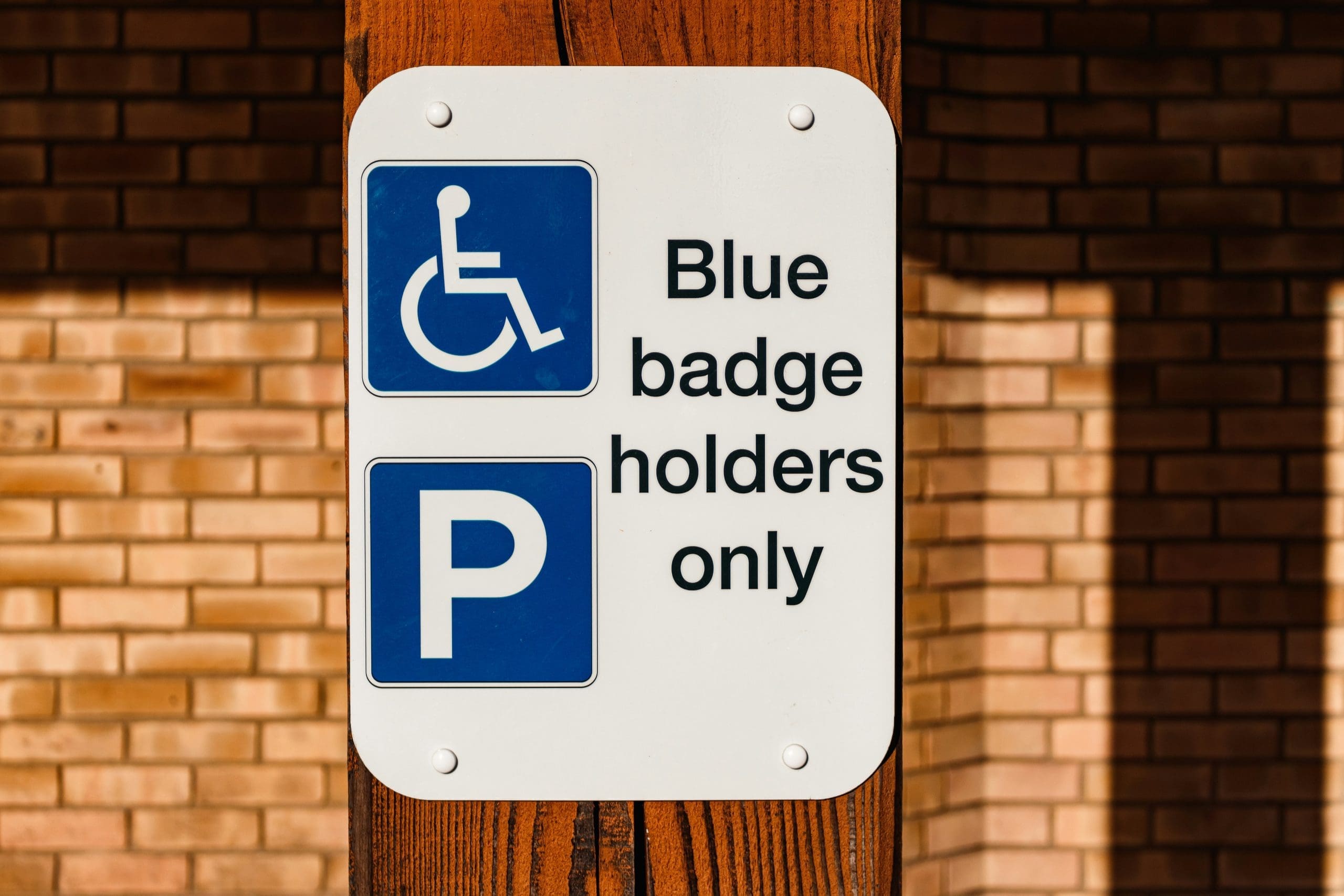 A sign offering parking for blue badge holders